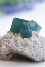 Load image into Gallery viewer, Blue Green Cubic Fluorite on Candle Quartz
