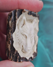 Load and play video in Gallery viewer, Hand-Carved Deer Antler Wolf
