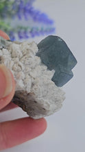 Load and play video in Gallery viewer, Blue Green Cubic Fluorite on Candle Quartz
