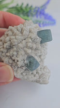 Load and play video in Gallery viewer, Blue Green Cubic Fluorite on Candle Quartz
